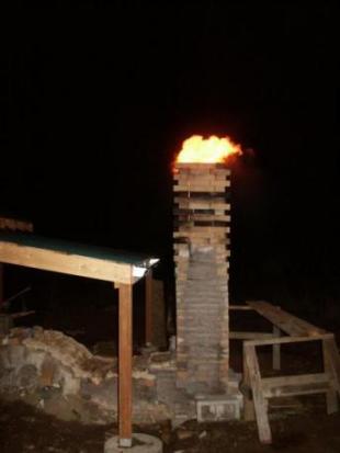 wind blown flame from anagama chimney